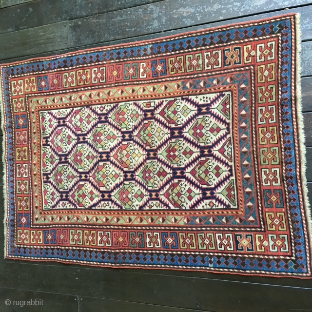 Stunning Antique Caucasian Kuba or Dagestan rug with field lattice design containing colorful palmettes. All natural dye colors including gorgeous light greens, blues and yellow. Very good condition with original ends and  ...