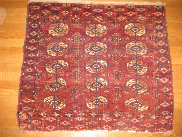 Antique Tekke wedding rug, 19 C. Good, soft pile and all natural colors.
Two small repairs and one end missing about 1 inch. Small split in center. 
Size 2'10" X 3'3".   