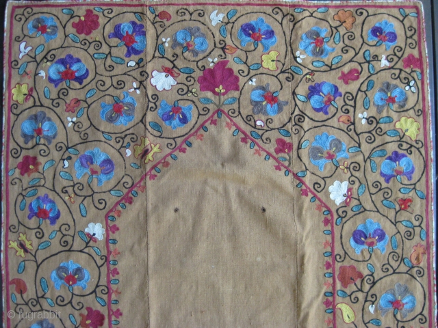 A Central Asian prayer Suzani? Probably late 19th C. Multiple-colored silk flowers embroidered on hand-spun linen. Very good condition except for two small holes in the mirhab. Great piece for the wall.  ...