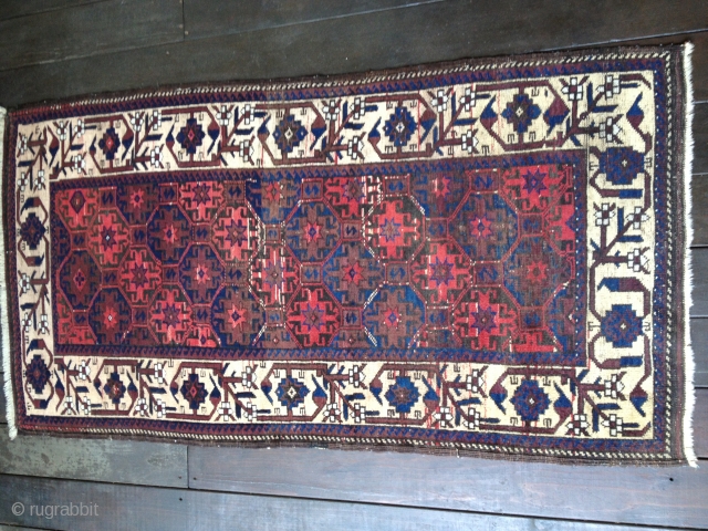 Antique Baluch rug, circa last quarter 19th C. All colors derived from natural dyes. Rare aubergine field. Abrashes as seen in photos. Good medium pile, lower in center. Soft,thin blanket-like handle. Unusual  ...
