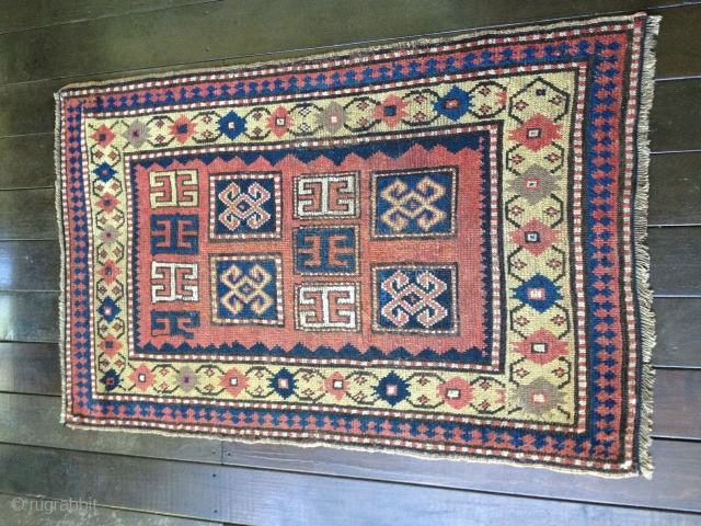 Beautiful small Kazak rug circa 1880s. All natural colors including a lemon-yellow border. Excellent condition with some professional reweaving in the field. 
Size 55X36in./140X91cm. Selvedges are original. Buyer pays shipping. Washed. Price  ...