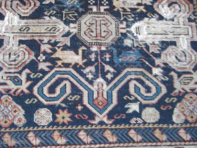 Small and fine Shirvan Perepedil rug, ca 1880s, with good colors and design. Parts in distressed condition as seen in photos. However, this piece is complete with only some fraying of original  ...