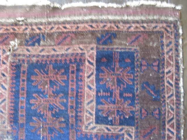 Baluch Timuri prayer rug, ca 19th C. Almost square format. Contains that great blue for which this type is well known. Some overall wear with a 4" hole on the right border.  ...