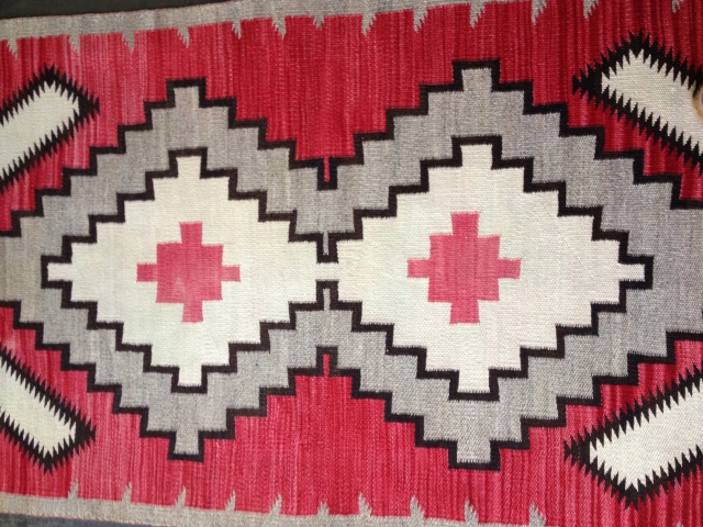 Navajo rug from the 1920s. Complete and in very good condition with only some sight fraying on corners. Good colors and there is no bleeding. Size 36X64"
91X163cm. Clean and ready for the  ...