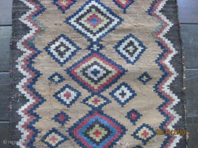 Small antique Luri kilim. All natural dyes. Excellent colors including camel field. Good condition except for some minor fraying on kilim ends. 32 X 20 in.
Clean. Great piece for the wall or  ...