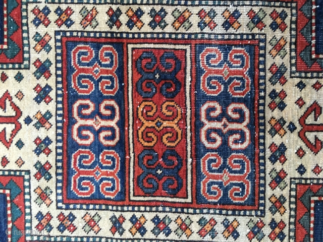 Antique Sewan Kazak Rug. Early 20th Century, 1910-1920. Lovely all organic colors including a natural orange and nice greens and blues. Original side cords and ends. Size 88"X 45"/223 X 114cm. Good  ...