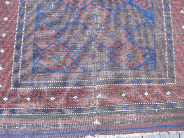 Late 19th C. Baluch rug, Good natural colors including a great electric blue. Overall low pile with wear as shown. Retaining kilim ends and original selvedges. Size 65X32in/165X81cm. Washed. Reasonable. Price reduced.  ...