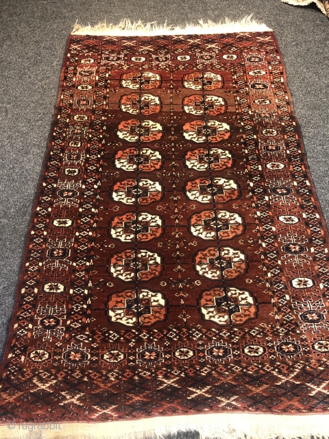 A lovely small antique Turkmen Tekke rug with 2 rows of Guls, Age: 19th century. Size: 170x105cm / 5'6''ft x 3'5''ft. All natural colors, good overall condition, little old moth damage at  ...