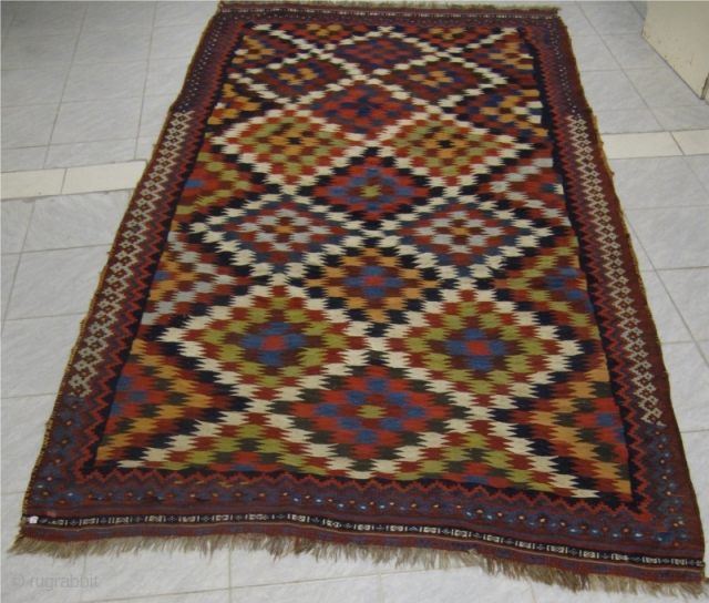 Antique Qashqai tribal kilim with a so called eye dazzler design.Beautiful colors.19th century.size: ca 315x175cm / 10'3'' x 5'7'' www.najib.de             