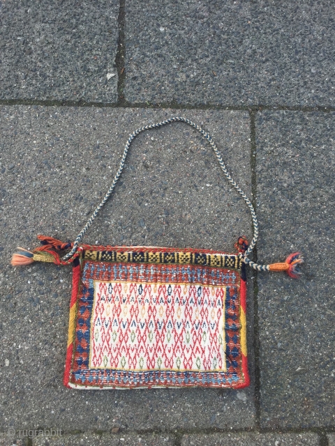 Lovely small flat woven Qashqai personal bag or so called "chanteh", very nice tribal weaving from Qashqai tribes of Southwest Persia. Wool pattern on cotton foundation, size: 25x20cm     