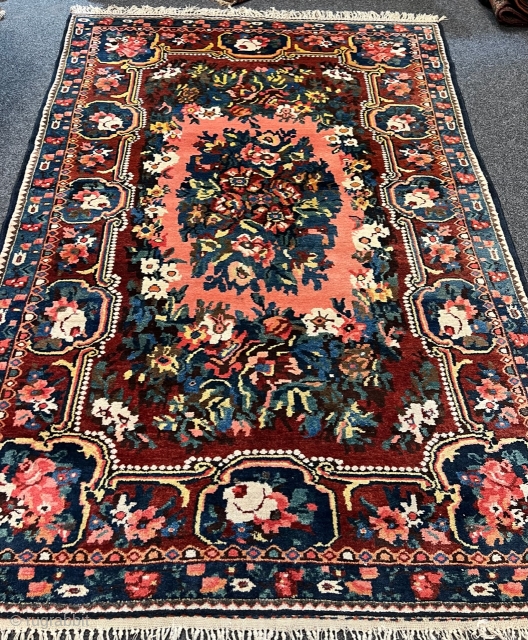 For flower lovers: A fine antique Persian Bakhtiary rug displaying a garden full of roses. This rug was woven in the village of Paradombeh, the design is inspired by French Aubussons. Age:  ...