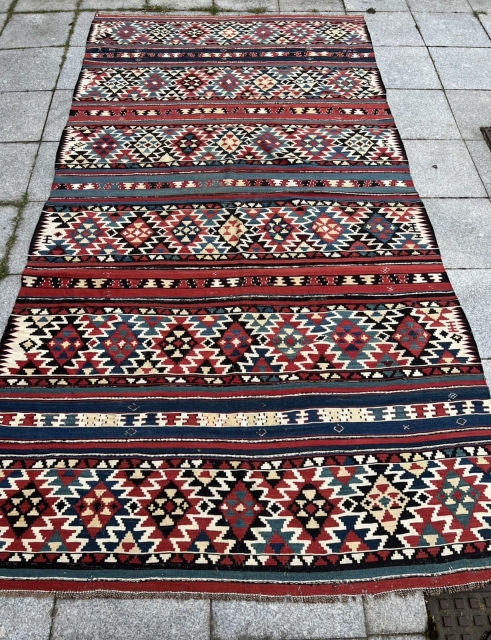 A colorful antique Caucasian Shirvan kilim from the 19th century, size: ca. 305x160cm / 10ft by 5‘3ft a few tiny old moth holes, otherwise good condition.       