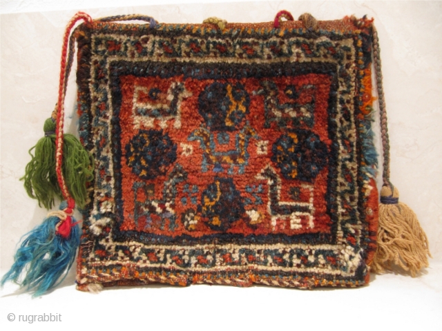 Antique Qashqai Gabbeh bag with animals.Age: circa 1900. Size: ca30x26cm. Nice collector´s piece.                    