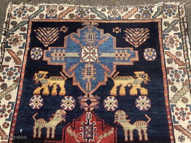 Look at the lions and giraffes in this playful and lovely antique Persian Bakhtiary tribal rug, size: 195x120cm / 6'4''ft x 4ft           