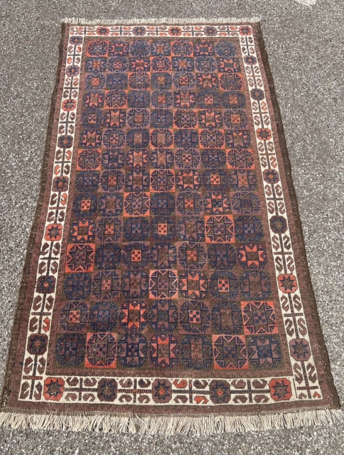 A very nice antique Baluch rug, unusual star design and beautiful white border. 19th century, size: ca. 167x95cm / 5‘5ft by 3‘1ft           