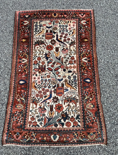 A lovely small antique Persian Bakhtiary rug with birds and flowers, size: ca. 125x70cm / 4’1ft by 2’3ft               