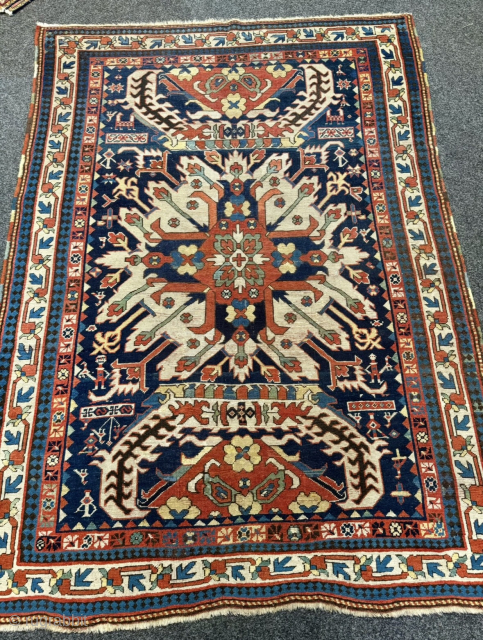 Rare Antique Eagle Kazak rug (Chelaberd / Sunburst), Caucasus circa 1800
A remarkable early example of the famous Eagle Kazak rugs: This rare Chelaberd piece from Karabagh features the iconic "Sunburst" medallion set  ...