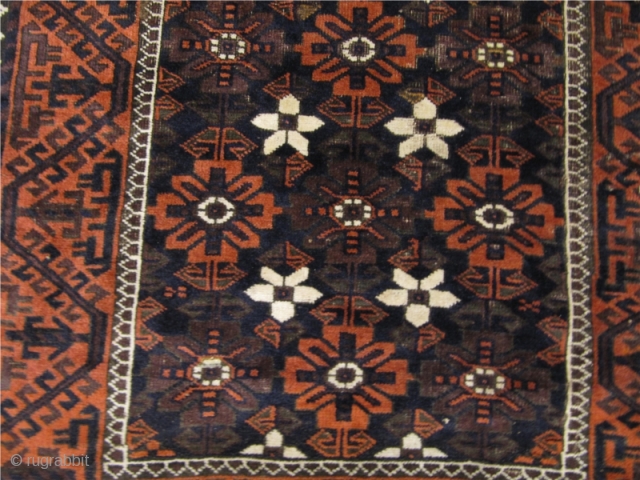 Archaic antique Baluch Mina Khani rug with running dog border. Origin: Northeast Persia. Size: ca 190cm x 100cm / 6'2'' x 3'3'' More pictures on www.najib.de       