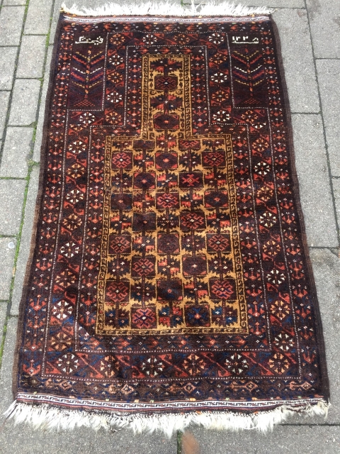 Rare Baluch prayer rug, signed and dated, size: 140x85cm / 4'6''ft x 2'8''ft, good condition except for a tiny old moth damage.           