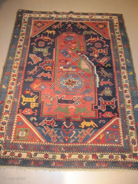 ref: S250 / KUBA SEICHOUR  , CAUCASIAN ANTIQUE RUG 19TH CENTURY , VERY UNUSUAL RUG WITH A LOT OF ANIMALS INSIDE "A CAUCASIAN ZOOLOGICAL RUG"  , one side is repaired.  ...