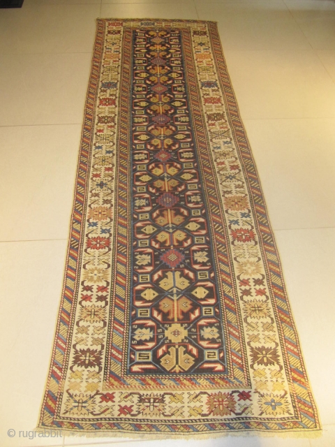 a) Kuba Caucasian rug, 19th century, perfect condition
size: 290 X 0.95  /  9' X 3'                