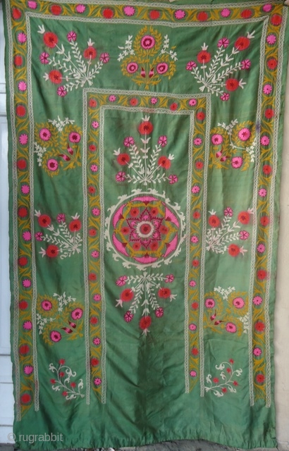 Antique Mint Green Hand Embroidered Silk Suzani

This is an antique suzani which was created in the early 20th century. The base is 100% hand woven fabric called shoi. The begiz style hand  ...