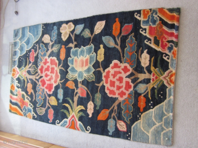 Tibetan : Khaden : Lotuses and other floral elements on saturated indigo ground. Tree of life motif. Foldover shot shows some small repair to lower selvedge, c.1930      