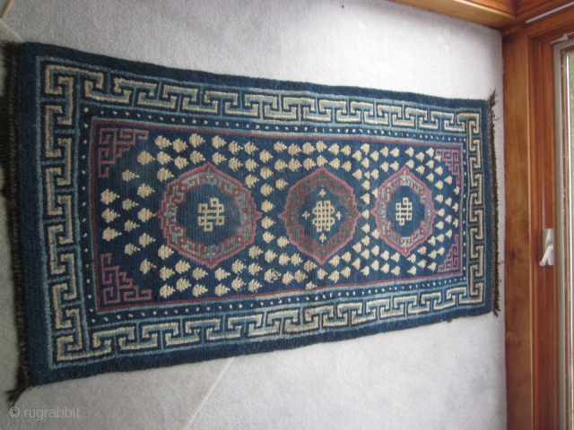 Tibetan: Khaden, about 3 by 6 ft., chunky feel, before 1900 frog's foot design, endless knot motif, some repair. Inexpensive             