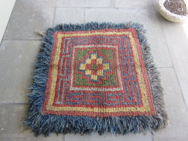 Tibetan wangden sitting mat for secular use, early 20th C.,40 by 40 inches                    