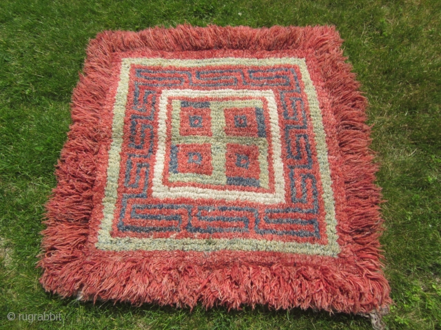 Tibetan wangden, ecclesiastical prayer and meditation rug, excellent condition, before 1900, about 36 by 36 inches.                 