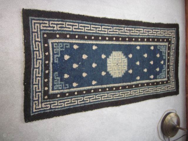 Tibetan Khaden- pre-1900, 27 by 54 inches, classic design in shades of indigo. some re-weaves                  