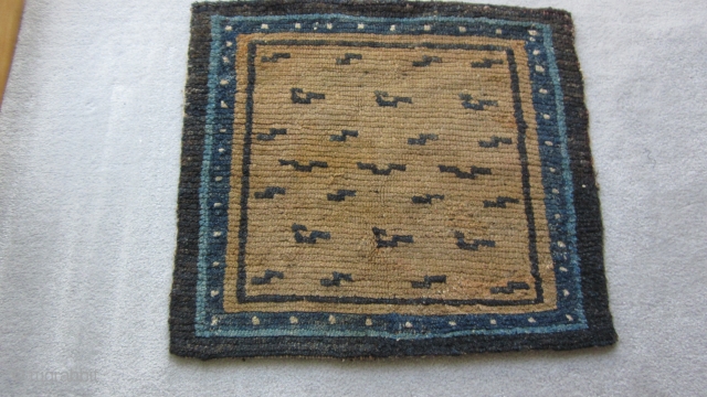 Tibetan mat with primitive tiger stripes. Before 1900. Some repairs. POR
                      