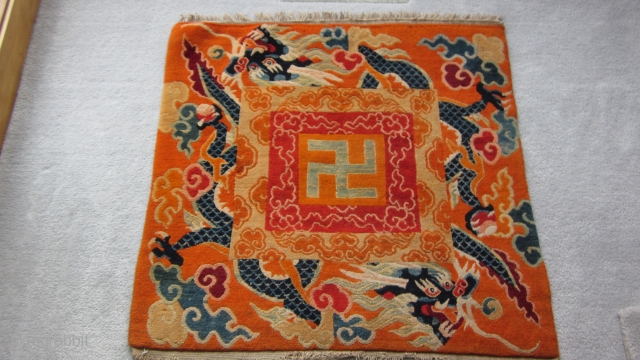 Tibetan mat, organized to copy Chinese silk design. Gelupga order colors. Expert two row repair at top, some fraying of lower selvedge. C.1920-30
SOLD, Thankyou         