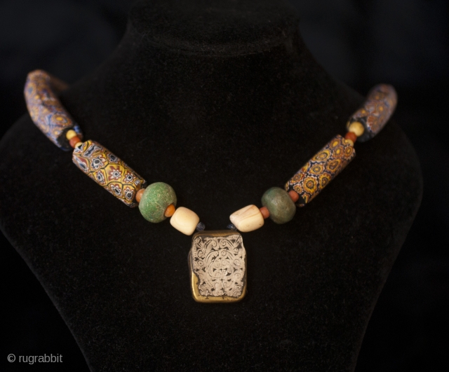 Old Berber pure chased silver and brass kitab from Ida ou Semlal, Anti Atlas, Morocco with 1850 Millefiori trade glass beads from Venice, old amazonite beads from Sahara and old coral, little  ...