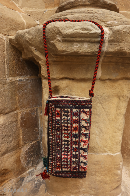 A Bakhtiari spindle bag. In many cases spindle bags are woven in one piece and folded over widthwise , as is the case in the present bag. All natural dyes, in mint  ...