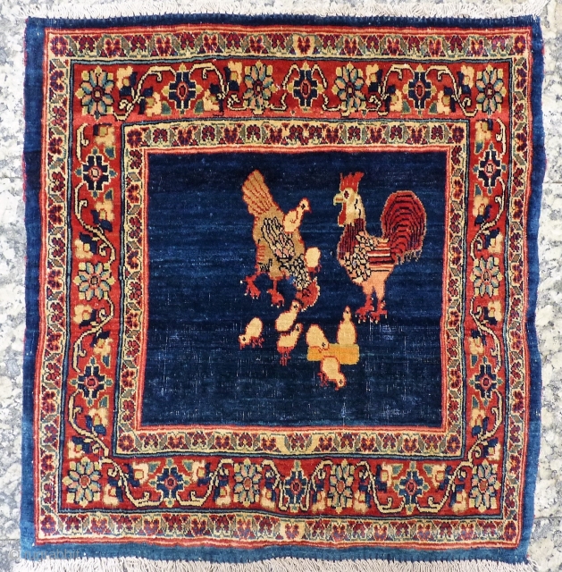 This family of free range chickens is happily living in this extremelly fine woven Persian rug, but are looking for a forever home (preferably vegetarian owners!). Great colours and shinny wool. 

62x60  ...