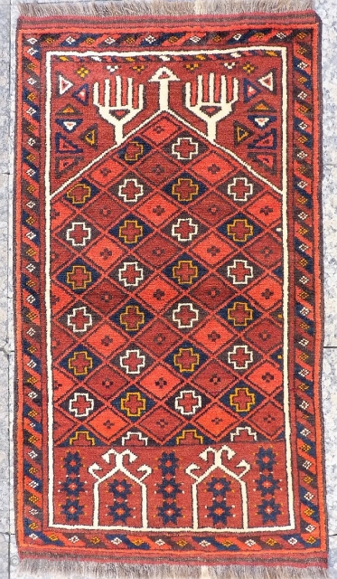 Turkoman Kizil Ayak.  A cute prayer rug with nice wool, full pile and checkered central field. Mint condition with full pile. 122x68cms (A1812020).

Please get in touch or buy this rug online  ...