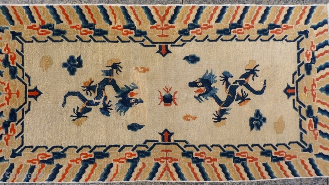 The central field of this Nigxia rug is dominated by two large dragons on a plain field. A rewoven area around one of the dragon´s head. 183x99 cms 1800-1850s, (A1512242).

Please get in  ...