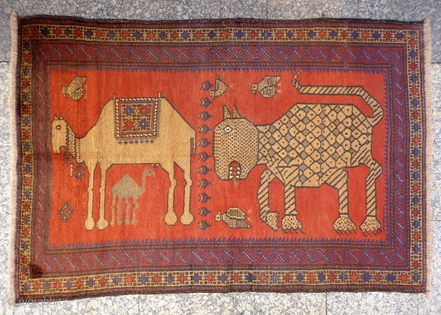 Although not so old, I love this very expressive rug woven by Belouch nomads from Herat region of Afghanistan. The fangs, the pelt, the claws etc. are like a cubist painting, that  ...