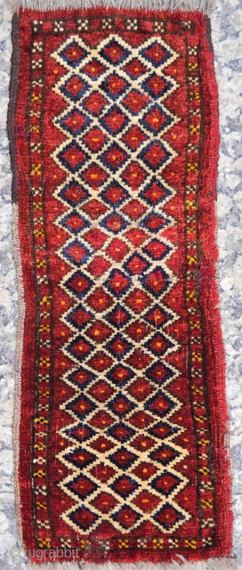 A Kunduz area, North East Afghanistan,
 cute little rug made by a young girl to learn the art of weaving. Glossy wool, with nice touches of yellow colour. 60x22 cms. (A1812031)  