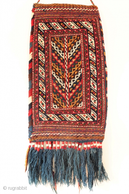 A superb soumak technique Afshar spindle bag, with a tree of life motive in the front and a diagonal striped motive at the back. As it is the case in many spindle  ...