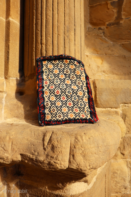 An antique little Qashqai bag that combines flatweave and knotted techniques.

https://www.nomada.biz/en/producto/antique-qashqai-chanteh-or-bag-from-iran-37x27-cms/                      