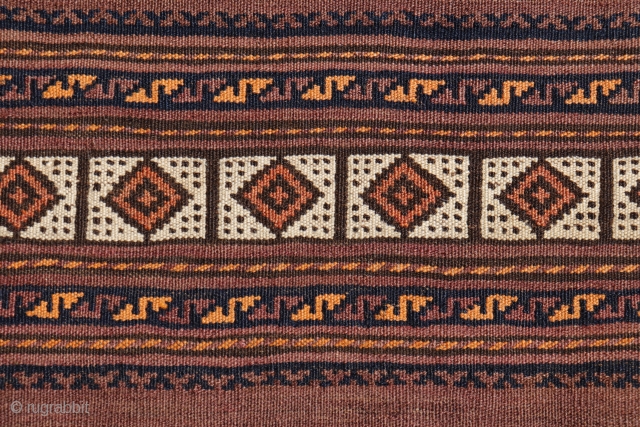 This kilim from the Aimaq Beluch tribe of Afghanistan is woven from finely spun wool with natural dyes. The color palette is restricted and sober, as the kilims of this tribe are  ...