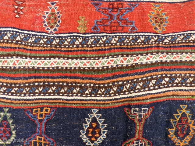 A beautiful Qashqai kilim that originally was a large bag. All the dyes are natural, including a beautiful green and mustard yellow. Very finelly woven. And yes, we know, it is not  ...