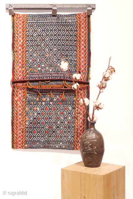 Exquisitely Fine Antique Qashqai Khorjin (Saddlebag)
If you’re searching for a truly finely woven saddlebag, your search ends here!

This antique khorjin, or saddlebag, is crafted with exceptionally fine wool and cotton. The front  ...