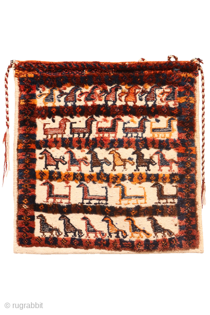 Antique Qashqai Chanteh: A Glimpse into Tribal Life
Large and truly authentic chanteh, or tribal bag, a piece that feels untouched by commercial circuits. Woven with a white cotton warp and weft, it’s  ...