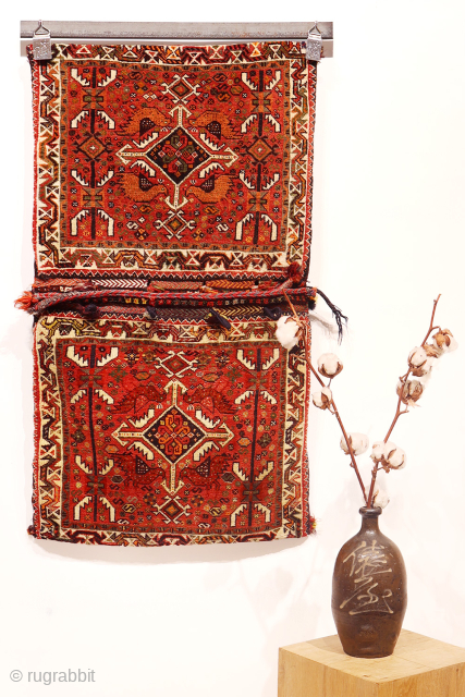 This khorjin, or saddlebag, is a delightful example of tribal weaving. Its focal point is a central medallion elegantly framed by four realistically woven birds nestled in the corners. A charming detail,  ...