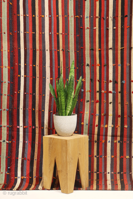 This big Qashqai kilim was woven with finely spun wool, showcasing exceptional craftsmanship. It is a moj (or jajim), a traditional kilim typically used to cover rugs and other textiles. However, this  ...