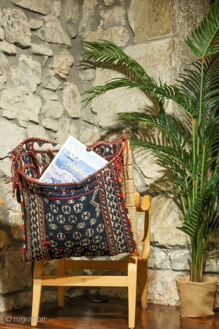 The weaver of this saddlebag from the Qashqai, was very creative when designing the saddlebag, particularly the backside of it. Woven with warp float weave technique. Natural dyes, some stains and repairs.
Material:  ...