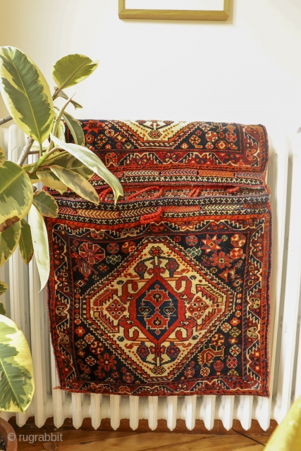 This antique saddlebag was very tightly woven by a Qashqai master weaver with natural dyes. In mint condition.
Material: 100% hand-spun sheep wool
Size: 110×60 cms
Origin: Qashqai tribe, Iran

You can purchase this saddlebag directly  ...